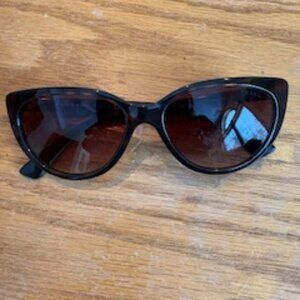 Prada tortoiseshell cat eye sunglasses
